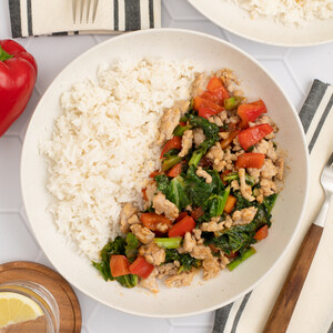 Chicken, Bell Pepper & Kale Stir-Fry with Peanut Sauce over Rice