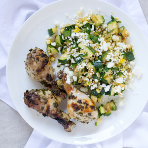 Lemon-Garlic Chicken Drumsticks with Zucchini, Corn & Feta Salad