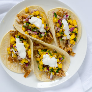 Fish Tacos with Mango-Jalapeño Salsa & Lime Crema