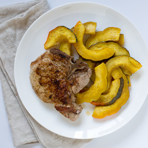 Pan-Fried Pork Chops with Maple-Roasted Acorn Squash