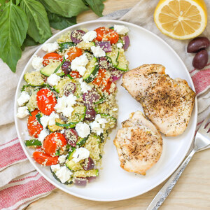 Roast Chicken Thighs with Tomato-Zucchini Couscous & Goat Cheese